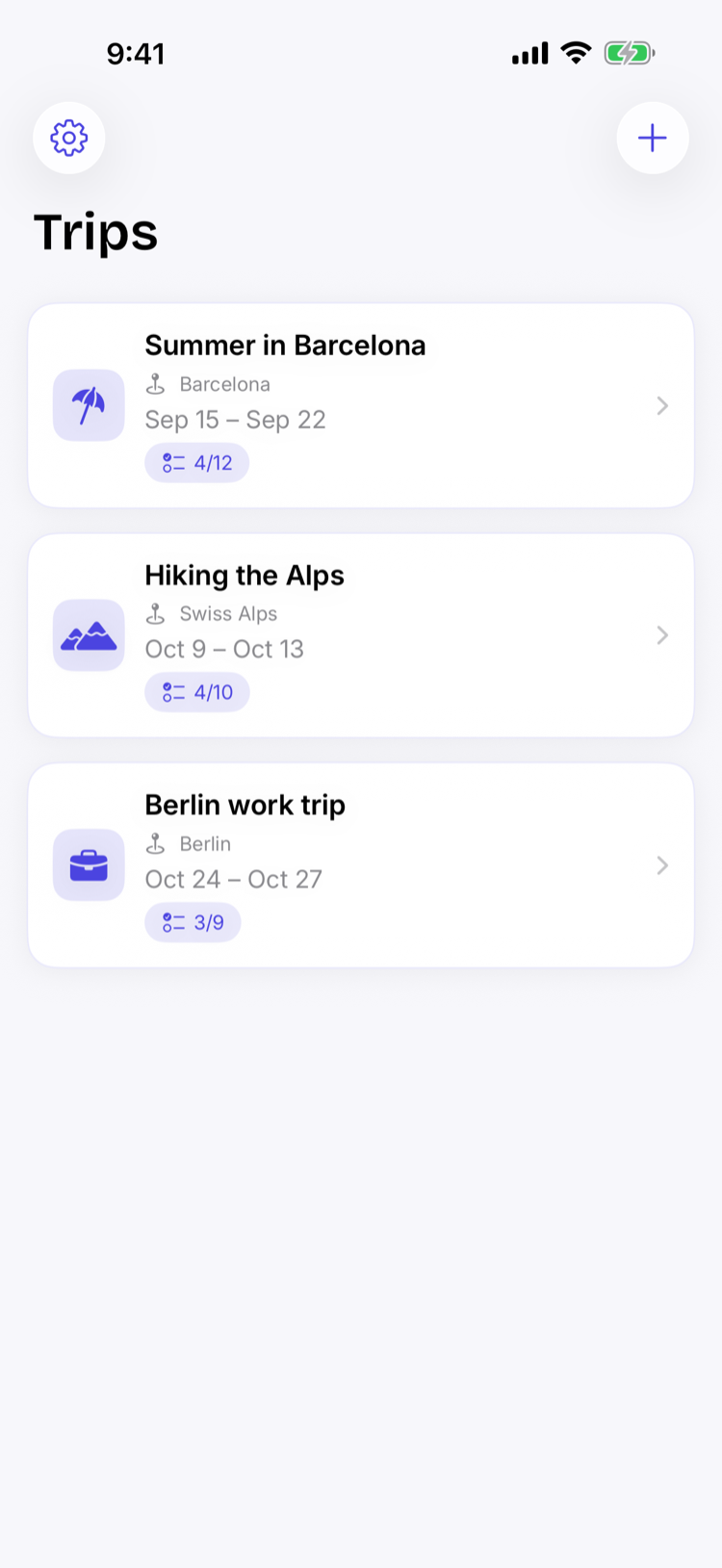 Saved trips list showing packing progress for each trip